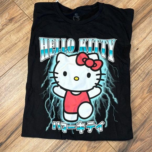 Hello Kitty Tops - Hello kitty t shirt in mens size. Brand new with tags